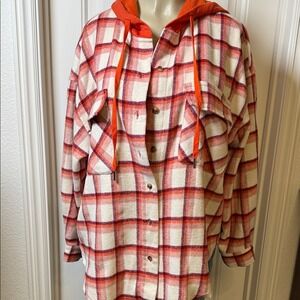 White Birch hooded plaid shacket (shirt-jacket) in orange/cream with a raw hem